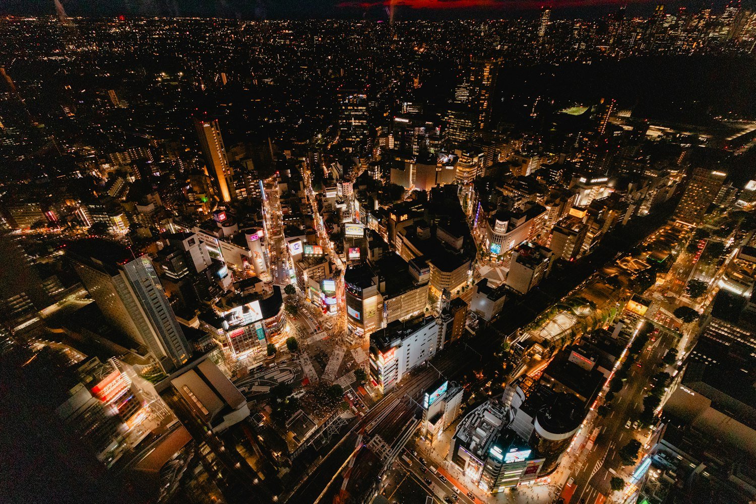 City at night from above — trips in motion