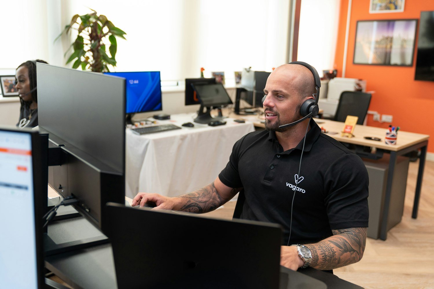 Apex dispatch specialist at work wearing a headset